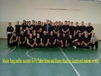Master Tang with his assistant Si-Fu Takis Dimas, and Master Maurizio Zanetti and students in Italy